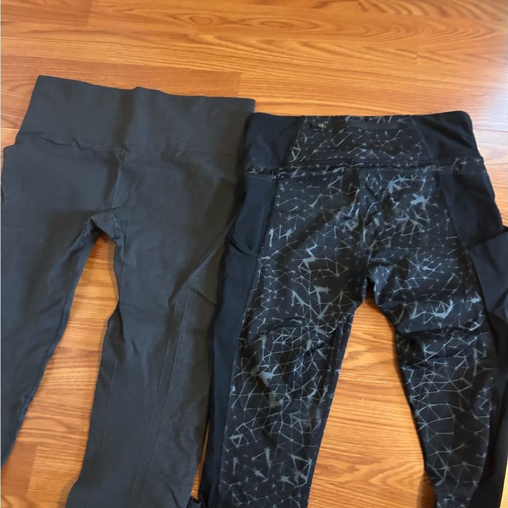 2 pairs of Lululemon leggings. Both size 8.